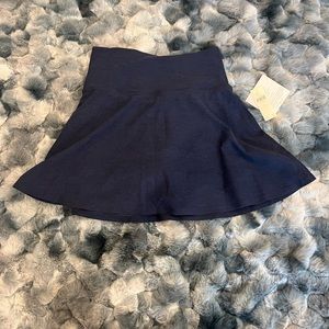 Navy BeyondYoga skirt with lining on inside. perfect for athletics. Super soft!
